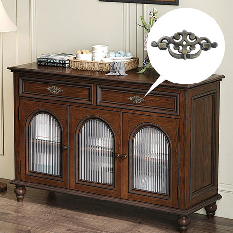 Retro Bronze Cabinet Pulls Set Of Four In Zinc Alloy With Exquisite Carved Detailing for Vintage Furniture on a wooden cabinet