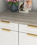 Installed five pack finger edge pulls on white cabinet drawers, brushed brass finish, elegant kitchen tab pulls, six and a quarter inch centers.