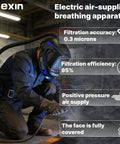 Worker using Powered Air Purifying Welding Helmet With Rechargeable Respirator System True Color Vision 4 Arc Sensors DIN 5 To 9 And 9 To 13 Ideal For Welding Grinding And Cutting Reduces Dust Smoke And Fumes Comfortable All Day Wear in workshop.