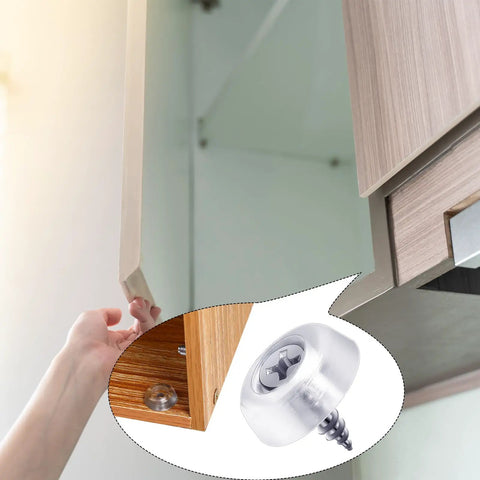Close-up of 100 pcs clear rubber door stops with screws installed on cabinet door, reducing noise and protecting cabinet surfaces.