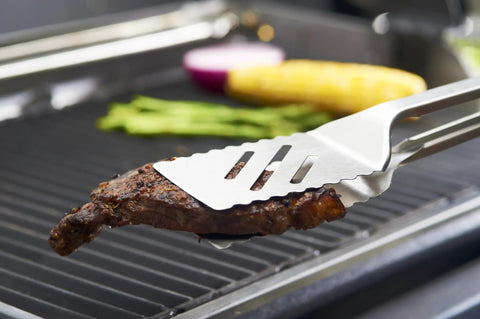 16-Inch Stainless Steel Tong And Turner Combo With Red Soft Grip Inserts, Locking Design, grilling steak on BBQ