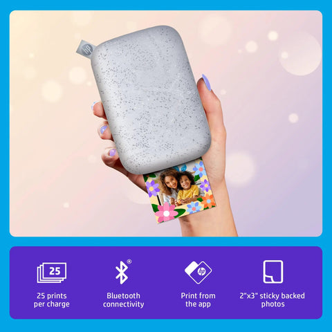 Pocket Sized Photo Printer For Instant Two By Three Inch Sticky Back Photos From Your Phone On The Go Luna Pearl Edition in hand