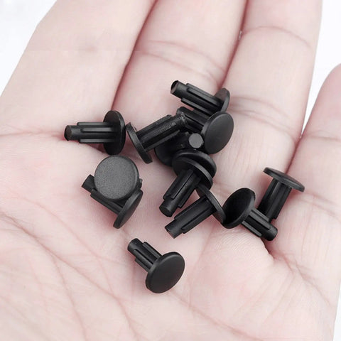 Heavy Duty Rubber Screw Plugs For M5 Threaded Holes Bike Frame And Car Panel Seal Covers in hand, ten black rubber plugs.