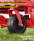 Flat Free 13x5.00-6 Tire And Wheel Set for Zero Turn Mowers showing durable polyurethane build on mower