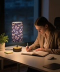 Watercolor Butterfly Decor Bedside Lamp With 3 Way Dimmer And Touch Control Charging Station on office desk at night