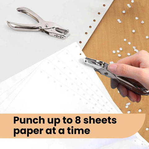 Hand using Seventeen Piece One Eighth Inch Circle Hole Punch Set for crafts on paper with punched confetti visible