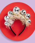 Disco Ball Headband For Parties And NYE Fits Adult And Kid Shiny Foil Crown with 5 disco balls on red background