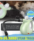 Hella Badass Handheld Steam Cleaner With 3 Bar High Pressure and 11 Piece Chemical Free Kit showing on-demand steam trigger in use.