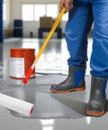 Person using 9 Inch Screed Spiked Roller For Epoxy Floors Pro Grade Latex Self Leveling Tool With Threaded Handle And Frame