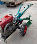 Go To Two Wheel Walking Tiller For Home Garden And Farm Use Mini Cultivator Machine with large wheel and handles on pavement