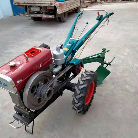 Go To Two Wheel Walking Tiller For Home Garden And Farm Use Mini Cultivator Machine with large wheel and handles on pavement