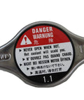 Top view of the Honda Radiator Cap 19045-PAA-A01 Chrome Finish Replacement with warning labels