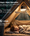 Top Rated Portable Ceiling Fan And Battery Operated Tent Fan Crafted For Campers Craving Straight Up Chill Airflow And No Sweat Remote Control For A Sweet Weekend Getaway in a tent with a child sleeping.