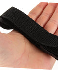 Close-up of black adjustable strap from 8 Pack Garden Aerator Shoes Straps Easy Assembly For Lawn And Patio Aerating Spikes Shoes Not Included