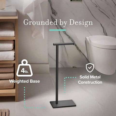 Modern Square Base Toilet Paper Holder Stand In Matte Black No Drill Install Free Weighted And Padded Base For Stable Rust Resistant Metal Bathroom Accessory 22.25 Inch Tall in bathroom setting
