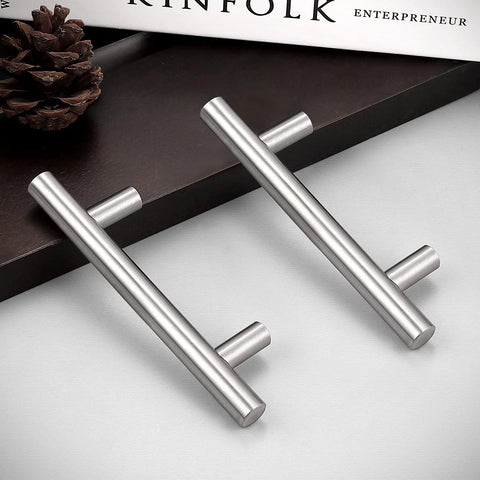 Two brushed nickel Euro T Bar pulls shown on a dark surface, part of 30 Pack 3 Inch Hole Centers Kitchen Cabinet Handles in stainless steel.