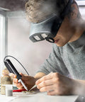 Person using Automatic Desoldering Pump With Pro Grade Power, Solder Sucker Vacuum, Portable 30W Desoldering Iron Tool at a workstation