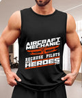 Mens Aircraft Mechanic Hero Tank Top Packed With Streetwise Summer Undershirt Vibes And Sleeveless Muscle Cut Designed For Real Gym Grind Or Casual Outdoors Made From Solid Cotton That Truly Hits The Spot worn by a man in a gym setting.