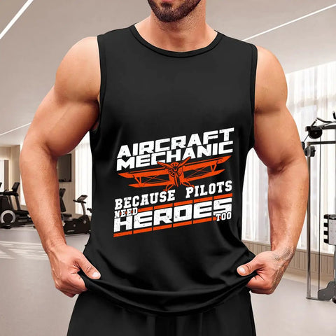 Mens Aircraft Mechanic Hero Tank Top Packed With Streetwise Summer Undershirt Vibes And Sleeveless Muscle Cut Designed For Real Gym Grind Or Casual Outdoors Made From Solid Cotton That Truly Hits The Spot worn by a man in a gym setting.