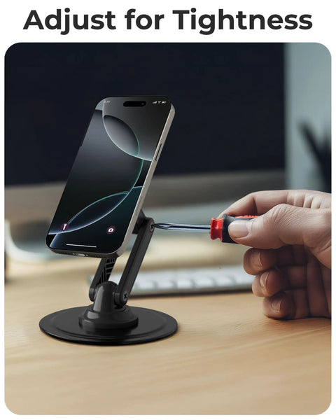 Person adjusting MagSafe Desk Stand For iPhone 17 Pro Max 16 15 14 13 12 With 360 Degree Rotating Head Height Adjustable Magnetic Phone Holder For Desk Metal Ring Included Black Securely Holds MagSafe Phones using screwdriver.