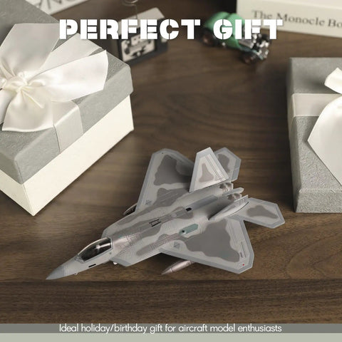 One Hundredth Scale F 22 Raptor Fighter Jet Model Dope Diecast Aircraft for Collectors on wooden table with gift boxes