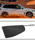 Front Right Tow Hook Cover For BMW G05 X5 M Sport And M50i 2019-2022 with SUV shown on a sandy terrain in background