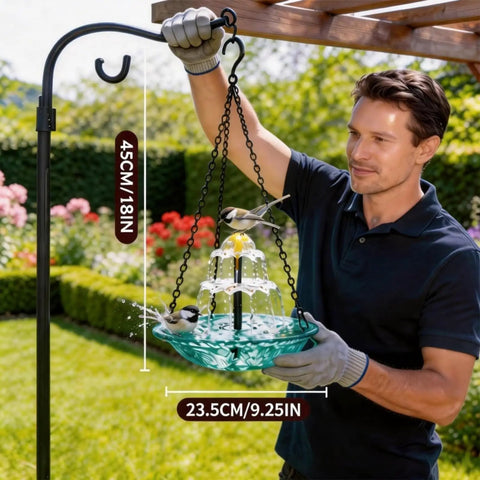 Man hanging a Solar Powered Hanging Bird Bath Fountain For Outdoor Garden And Patio, Cascading Water Feature, blue bowl