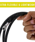 Premium Six Foot Nylon Braided Airbrush Hose Pairing Dual Threaded Adapters For Steady Compressor Flow And Super Flexible Tubing Setup That Seriously Slaps held in hand showcasing flexibility.