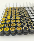 Close-up of 10 Pack 1/64 Diecast Car Wheels And Tires Set With Mixed Rubber Tires for Custom 1/64 Models, showing various rims and axles.