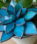 Blue stained glass flower with six petals, part of the Stained Glass Soldering Jig 4 Layer Flower Mold Set for succulent art.