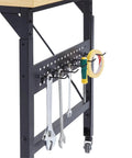 Heavy Duty 48 Inch Adjustable Workbench With Pegboard And Smooth Rolling Casters Built Like A Tank For Welding Jobs And Knockout Garage Tool Storage With AC USB Charging Ports And Sweet Hanging Hooks showing hanging tools on pegboard.