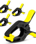 Front view of a 6-inch heavy-duty plastic spring clamp in black with yellow jaw pad; pack of four.