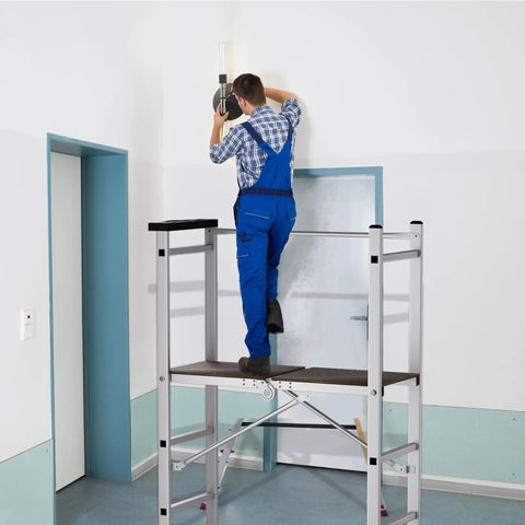 5 Foot Foldable Aluminum Scaffolding, Portable Rolling Work Platform With Adjustable Height, Scaffold Tower And Ladder Stool, Multiuse Work Bench, Lightweight Aviation Aluminum Alloy, Boss Level Stability, 330 Lbs Capacity, Easy Setup used indoors by worker