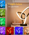 RGB LED Modern Table Lamp With 7 Colors, 10 Light Modes, And 3 Way Dimmable Touch Desk Lamp in spiral design on nightstand
