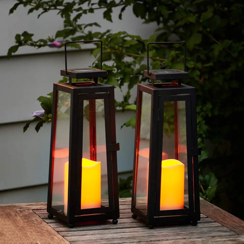 Outdoor Solar Lanterns With Flameless Candles Two Pack 11 Inch Tall Black Metal Glass Lanterns For Patio No Fuss Waterproof