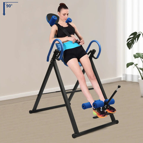 Person using Inversion Table For Back Pain Relief With A 330lb Capacity Decompression Stretcher, blue and black design