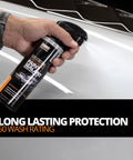 Hand holding Platinum Rapid Ceramic Paint Sealant Spray 14 Oz With 50 Wash Rating For Boss Gloss And Shine over car surface.