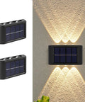 Up And Down Solar Fence Lights 2 Pack Waterproof Solar Step Lights Warm White Outdoor Deck Lighting Easy Install For Patio Yard Porch Shed Pool And Stairs Illumination shown mounted on wall.