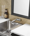Premium RV Sink Faucet with Spotless Chrome Finish Heavy Duty 360 Swivel Marine Cold Water Tap Compact Deck Mount Setup for Camper Van Yacht and Weekend Road Trips installed in a modern kitchen.