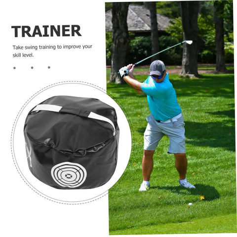 Portable Golf Impact Training Bag Swing Trainer in black used outdoors, golfer practicing swing on grass.
