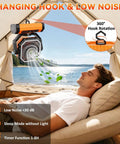 Beast 20000mAh Rechargeable Camping Fan With Digital Battery Gauge hanging in tent with relaxed person.