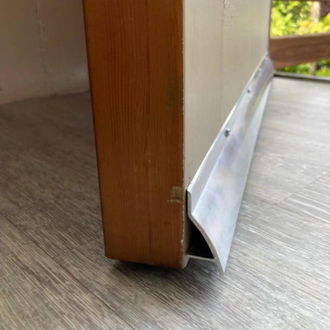 Heavy Duty Door Rain Drip Guard And Slim Drip Edge Cap To Keep Exterior Door Bottoms Bone Dry And Kick That Backing Flood Water Straight Past Your Entryway Today mounted on wooden door frame.