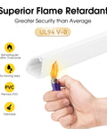 Hand testing flame resistance on Large Corner Cable Concealer For Walls Floors And Ceilings Paintable Wire Covers For Cords Corner Cord Hider