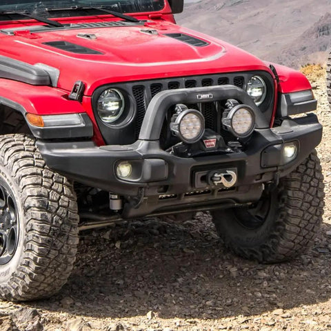 Off-road Jeep with AEV Winch Hook Isolator Fairlead Protector Hook Stopper For Off Road Winching on front bumper, rocky terrain