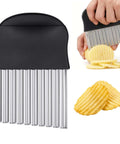 Front view of stainless steel crinkle cutter with black handle; ribbed blade for crinkle-cut fries.