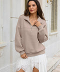 Woman wearing Cozy Oversized Women Quarter Zip Fleece Sweatshirt With Half Zip Collared Long Sleeve Pullover For Fall And Winter Soft Cotton Polyester Blend Coffee Gray