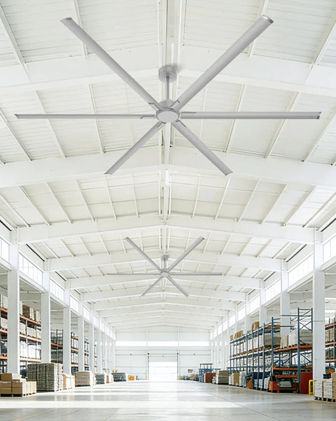 No Sweat 120 Inch HVLS Ceiling Fan For Shops And Gyms, large silver fan with aluminum blades in a spacious warehouse.