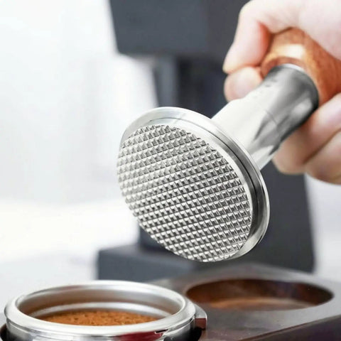 Straight Up 58mm Espresso Tamper For Dead On Pulls Daily Brushed Stainless Steel Coffee Press with solid wood grip in use