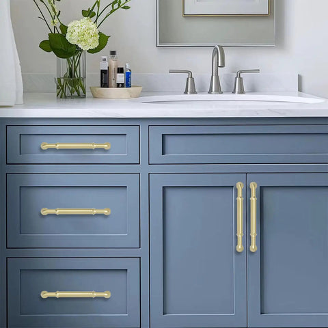 Brushed Gold Cabinet Pulls 2 Pack Three and Three Quarters Inch Center to Center 4.4 Inch Length Matte Gold Drawer Handles on blue cabinet.