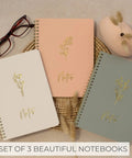 Stylish Aesthetic Spiral Notebook Set Of 3 For Women With Cute College Ruled 8x6 Journals Displayed on Wicker Tray with Glasses